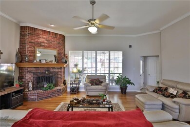 A spacious family room is dressed with crown moldi