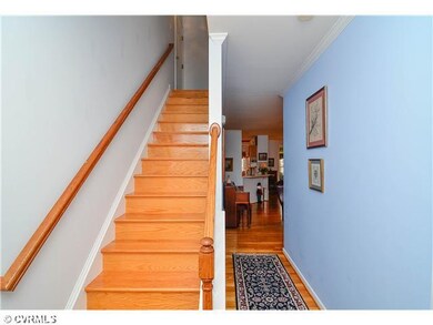 Exterior Front - Warm hardwoods in the foyer welco