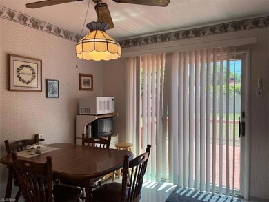 Eat-in kitchen with access to deck.