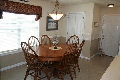 HUGE EAT IN AREA, NICE TILE WORK AND FIXTURES, WIT
