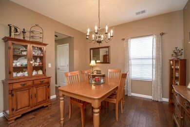 Formal dining room with access to kitchen