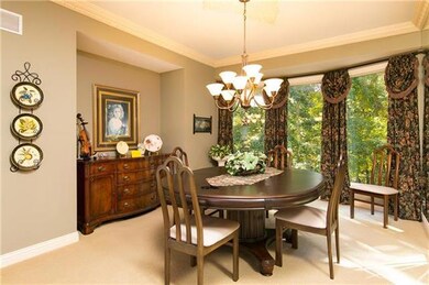 Large formal living room with yet another view of 