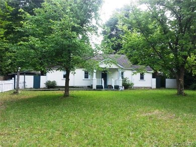 Front View - Country Home with white Picket Fence