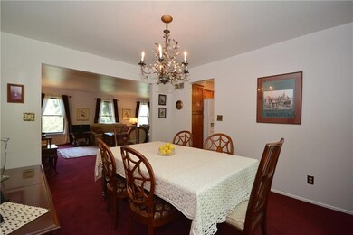 Formal Dining Room open to Living Room and Kitchen