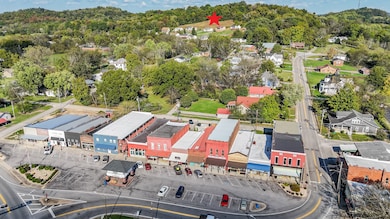 Red Star marks location of property.
