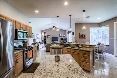 View of Kitchen towards Family Room and Eat-In Din
