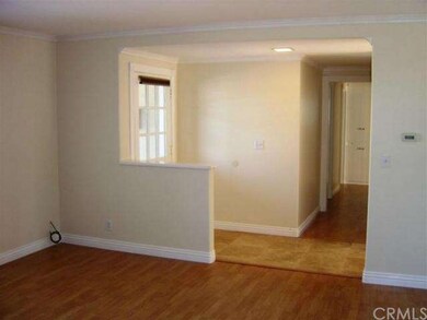 Open entry to large living room.  Custom Travertin