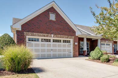 Pull into the driveway into the attached two-car garage.