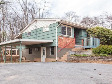 carport with basement entry