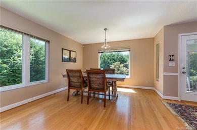 Dining room.  Large sized windows to bring in the light