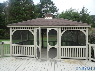 Dock with a wooden deck and a gazebo