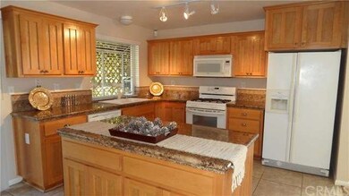 Granite Tile Countertops with custom Back-splash a