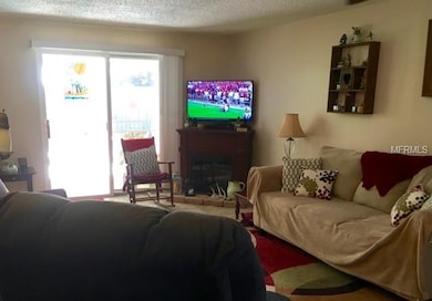 Living room view to patio/pool