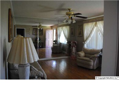Living room has lots of light--great for entertaining.