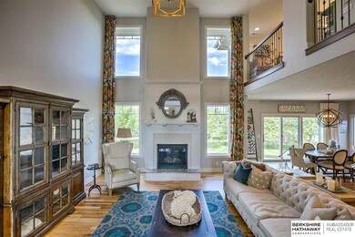 Great Room features 18' Ceilings, Hardwood Floors, and Tons of Natural Light