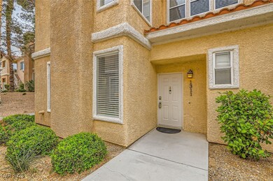 Entrance to property featuring stucco siding
