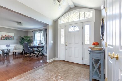 Looking into den/ dining room with hardwood floor