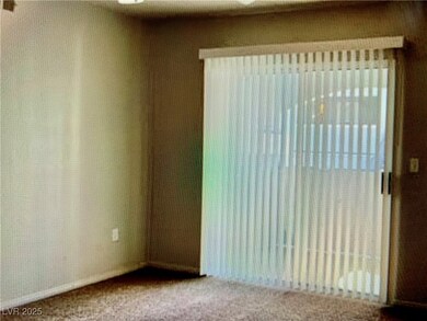 Empty room with carpet flooring