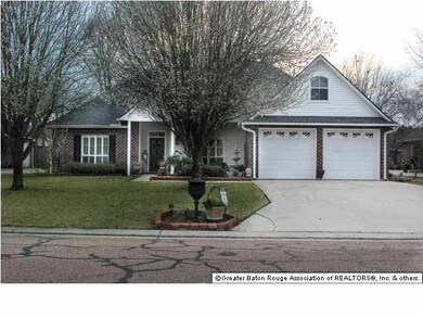 Landscaped yard, double garage