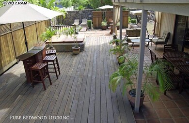 Uncovered pure redwood deck, includes teak bar and