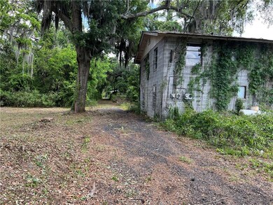 Paved alley behind lot