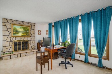 Living Room with wood burning fireplace and update
