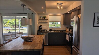 173 Rotonda Cir, Rotonda West, FL 33947 - photo 5