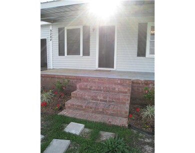 Exterior Front. Front porch with brick steps