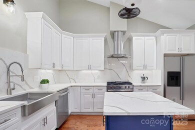 Kitchen w/Island & Quartz Countertops