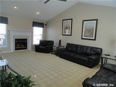 Great Room. Quality berber carpeting, gas fireplac