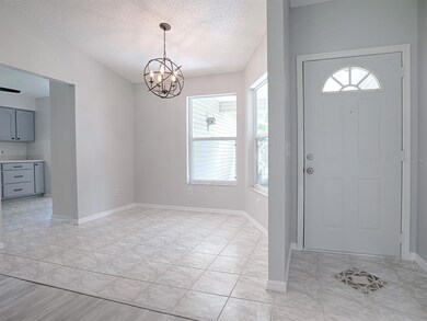 BEAUTIFUL TILE IN THE FOYER AND DINING ROOM 