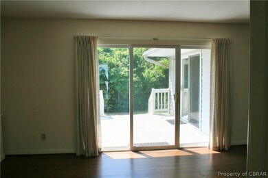 Large living room opens to the deck.