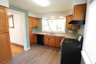 Kitchen featuring light hardwood / wood-style floo