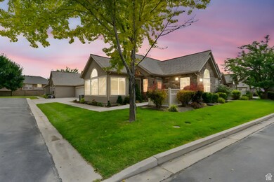 Ranch-style house with stone siding, driveway, a garage, and a shingled roof