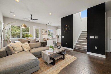 Living room featuring recessed lighting, stairway