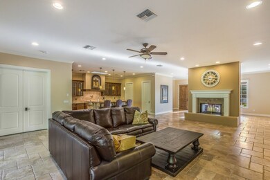 Cozy Fireplace and Opens to the Kitchen