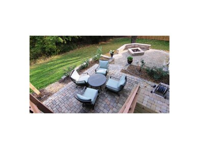 Custom Patio with Fire Pit overlooking the greensp