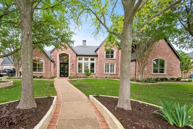 From View of Stunning Iron Doors and Lots of Windo