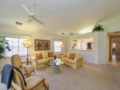 Great room to kitchen area with large pull up bar.