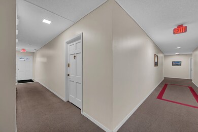 Inner corridor, first floor unit.