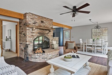 Fantastic interior spaces as well, with enough room for your guests. Beautiful brick fireplace on the main level provides a great focal point for the space, adding warmth and ambiance.