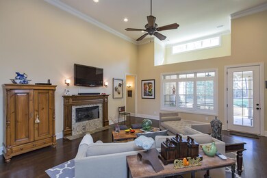 Open Floor Plan. Great Room. View to Covered Patio in Rear.