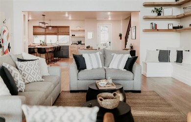 Living area featuring light wood finished floors and plenty of natural light