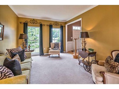 Living Room. The living room is adorned with large