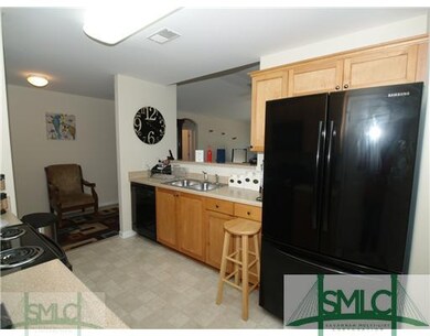 Kitchen. Beautiful light colored cabinets contrast