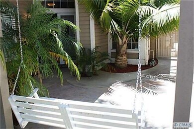 Welcoming porch swing at front entry