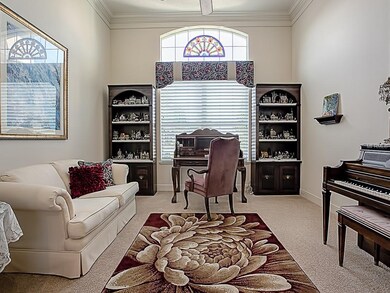 THIS ROOM IS THE FORMAL DINING ROOM BUT THE CASUAL