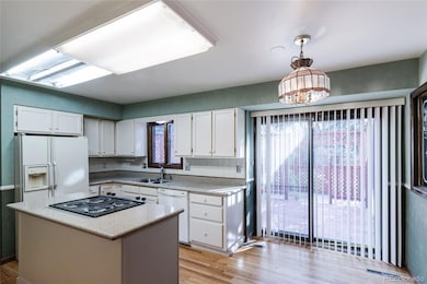 12280 E Vassar Dr, Aurora, CO 80014 - photo 5