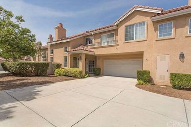 Front of house. Attached 2 car garage accessed by 