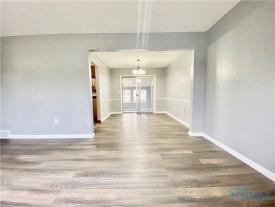 Formal Living Dinning area walking out to sunroom